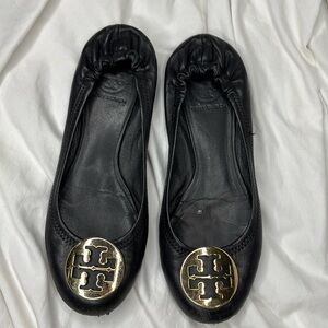 Black and gold Tory Burch flats